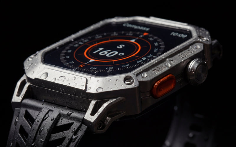 Njord APEX showing its compass screen, water droplets on the metal case